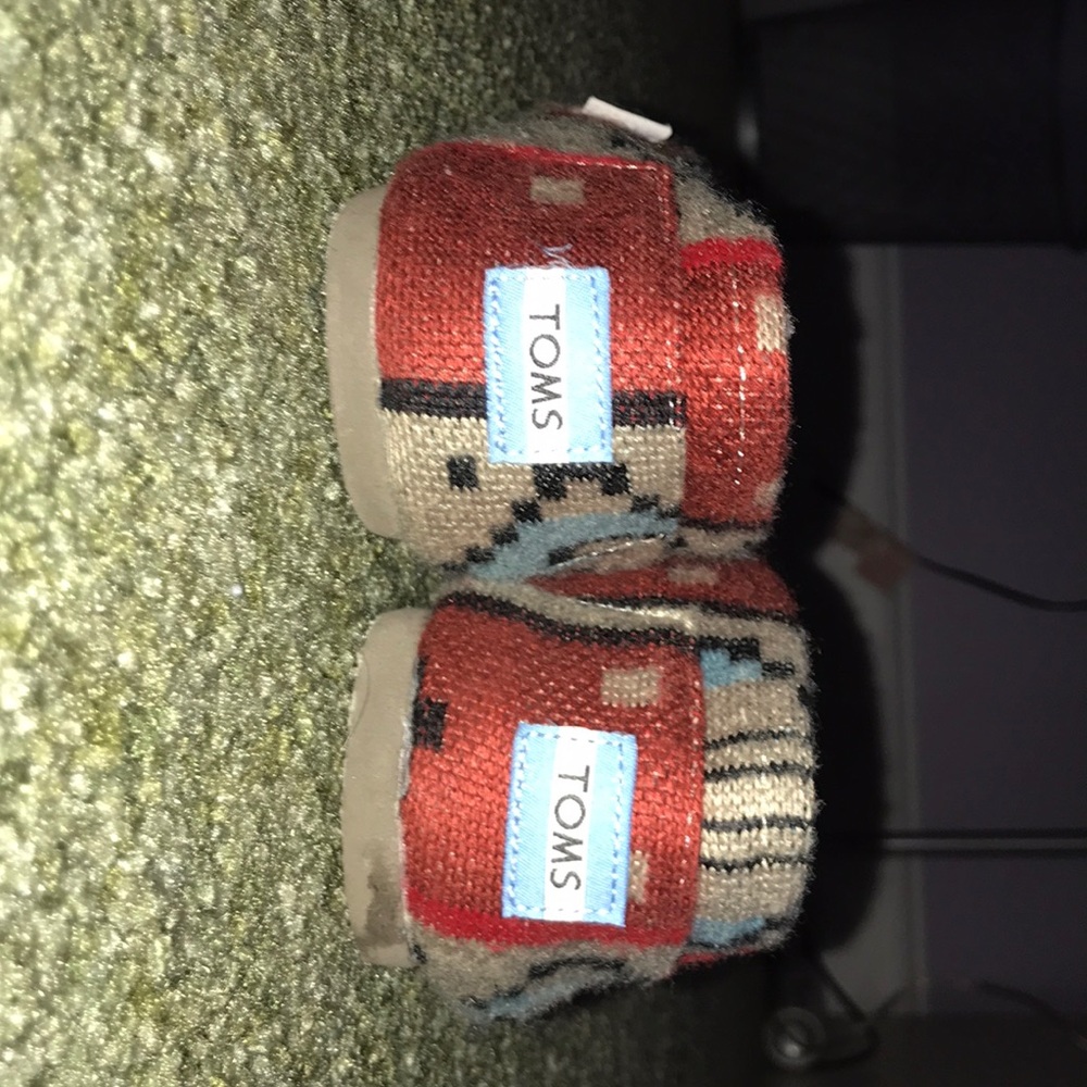 TOMS printed slip ons
